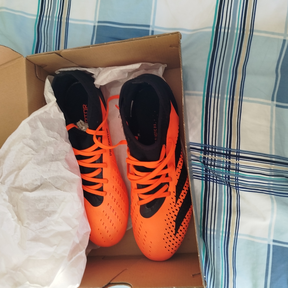 Orange and Black Soccer Cleats